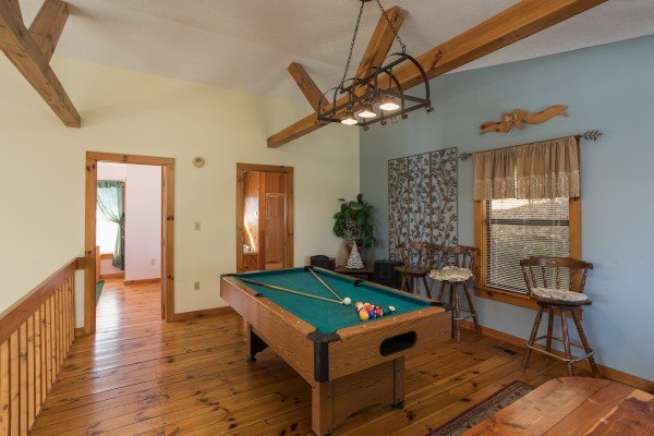 Pool table in the loft at Alone at the Top, a 3 bedroom cabin rental located in Pigeon Forge