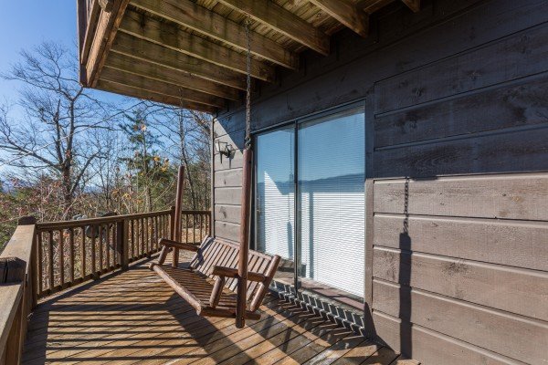 Porch swing at Alone at the Top, a 3 bedroom cabin rental located in Pigeon Forge