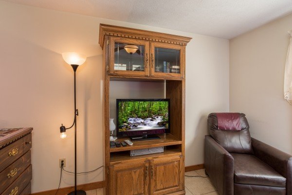 TV in a bedroom at Alone at the Top, a 3 bedroom cabin rental located in Pigeon Forge