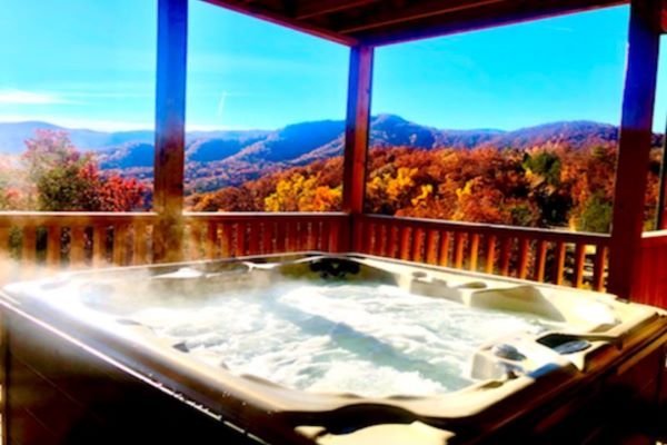 Hot tub at Four Seasons Grand, a 5 bedroom cabin rental located in Pigeon Forge