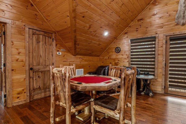 Poker table at Four Seasons Grand, a 5 bedroom cabin rental located in Pigeon Forge