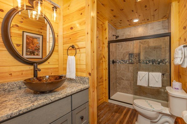 Bathroom with a walk in shower at Pool & a View, a 2 bedroom cabin rental located in Gatlinburg