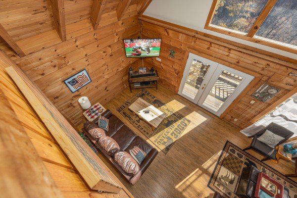Looking down at the living room at Brink of Heaven, a 2 bedroom cabin rental located in Gatlinburg