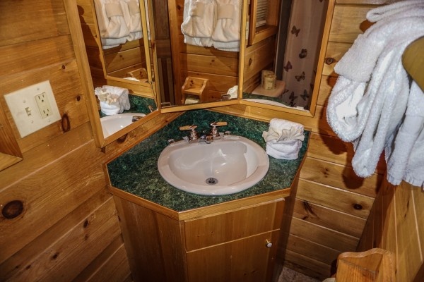 Bathroom vanity at Cozy Cabin, a 2-bedroom cabin rental located in Gatlinburg