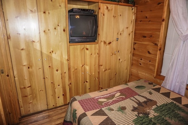 Closets at the foot of the bed at Cozy Cabin, a 2-bedroom cabin rental located in Gatlinburg