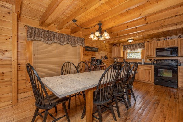 Dining table for 8 at Bears Don't Bluff, a 3 bedroom cabin rental located in Pigeon Forge