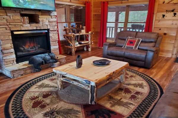 Wood coffee table  at Bears Don't Bluff, a 3 bedroom cabin rental located in Pigeon Forge
