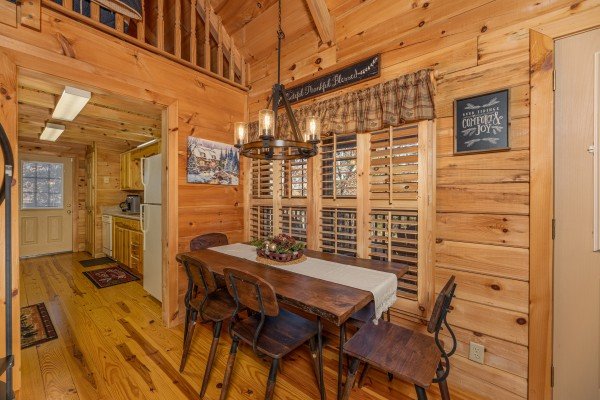 Table for six at Wilderness Adventure, a 2 bedroom cabin rental in Pigeon Forge
