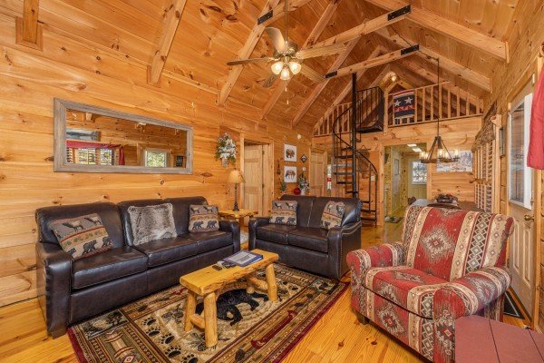 Sofa, loveseat, and chair in a living room at Wilderness Adventure, a 2 bedroom cabin rental in Pigeon Forge
