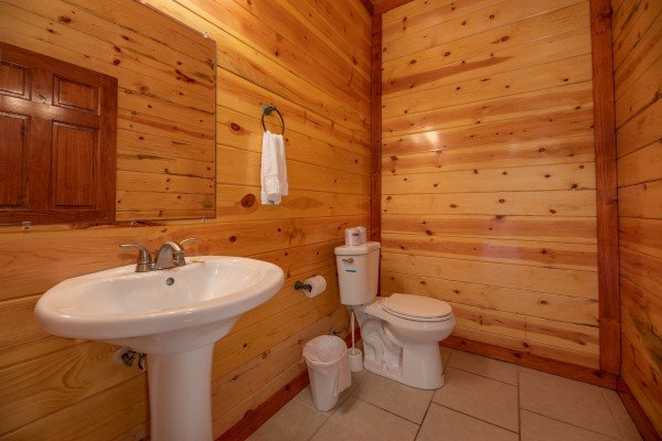 Bathroom at The Pool Palace, a 5 bedroom cabin rental located in Pigeon Forge