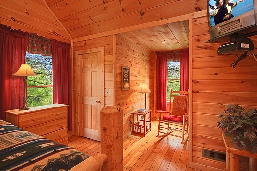Second floor bedroom seating area at Trapper's Trace, a 2 bedroom cabin rental located in Gatlinburg
