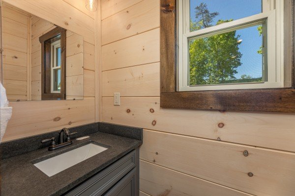 Half bath at Smoky Mountain Chalet, a 3 bedroom cabin rental located in Pigeon Forge