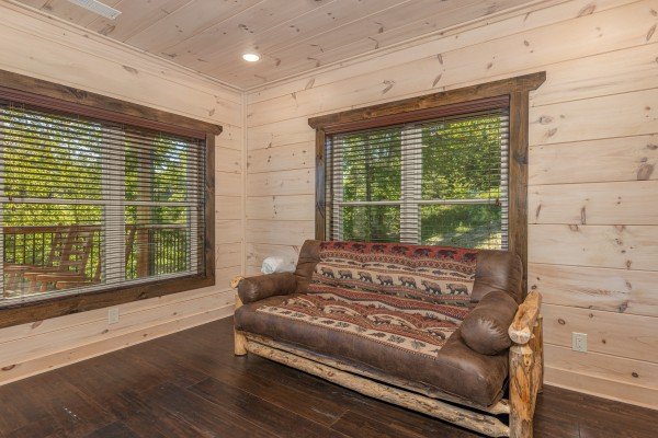 Futon at Smoky Mountain Chalet, a 3 bedroom cabin rental located in Pigeon Forge
