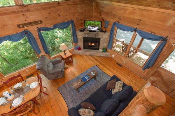 Looking down at the living room at Denim Blues, a 1-bedroom cabin rental located in Gatlinburg