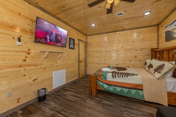 First TV in the double queen bedroom at Everly's Splash, a 4 bedroom cabin rental located in Pigeon Forge