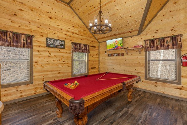 Pool table in the loft at Everly's Splash, a 4 bedroom cabin rental located in Pigeon Forge