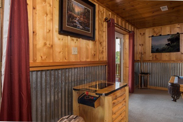 Multigame arcade at Endless View, a 4 bedroom cabin rental located in Pigeon Forge