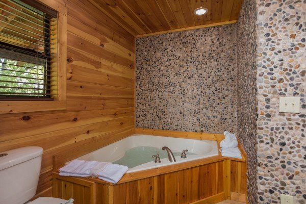 Jacuzzi in a bathroom at Endless View, a 4 bedroom cabin rental located in Pigeon Forge