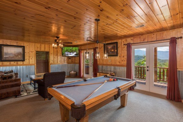 Pool table in the game room at Endless View, a 4 bedroom cabin rental located in Pigeon Forge