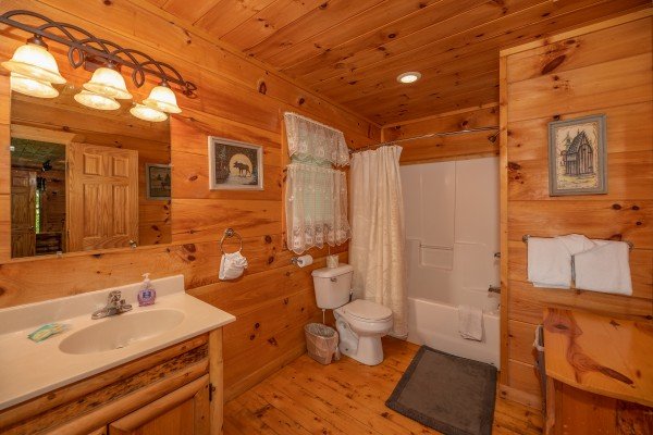 Master bathroom with tub and shower at Misty Mountain Escape, a 2 bedroom cabin rental located in Gatlinburg