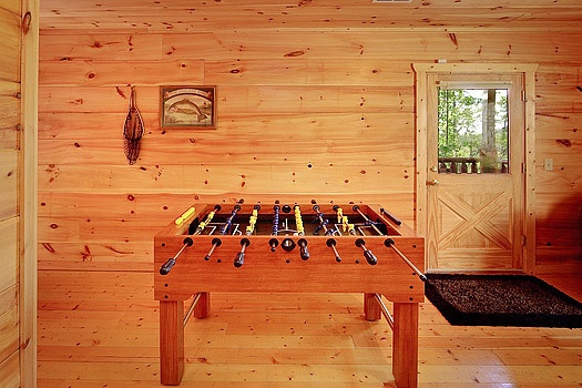 foosball table in game room at bearly makin' it a 1 bedroom cabin rental located in gatlinburg