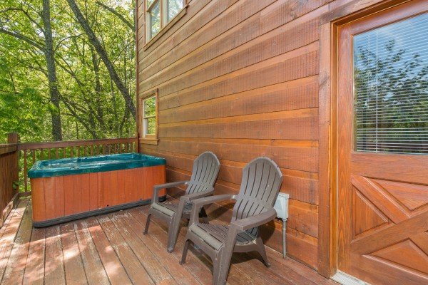Hot tub on a deck at Patriot Inn, a 1 bedroom Gatlinburg cabin rental