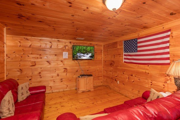 TV in the lower living room at Patriot Inn, a 1 bedroom Gatlinburg cabin rental