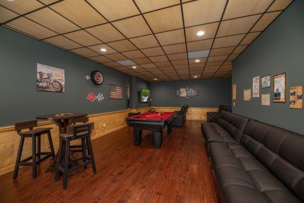Game room with pub table and pool table at Gar Bear's Hideaway, a 3 bedroom cabin rental located in Pigeon Forge