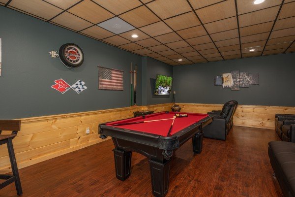 Pool table in the theater room at Gar Bear's Hideaway, a 3 bedroom cabin rental located in Pigeon Forge