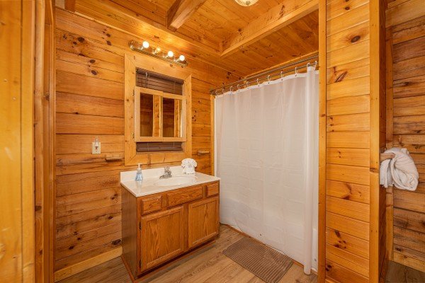 Bathroom with a tub and shower at Lakeview Point, a 2 bedroom cabin rental located in Douglas Lake
