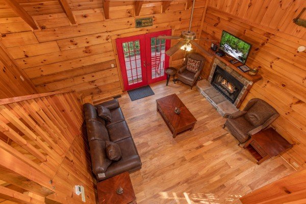 Looking down into the living room at Wonders in the Sky, a 3 bedroom cabin rental located in Gatlinburg