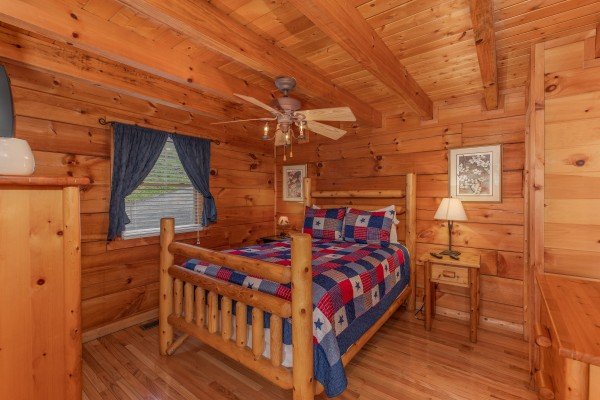 Bedroom at American Beauty, a 2 bedroom cabin rental located in Pigeon Forge