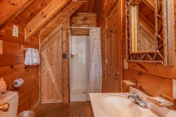 Bathroom with shower stall at American Beauty, a 2 bedroom cabin rental located in Pigeon Forge