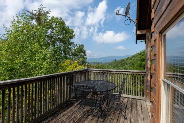 Mountain view and bistro table at American Beauty, a 2 bedroom cabin rental located in Pigeon Forge