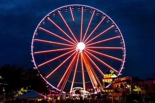 the island ferris wheel at night at american beauty a 2 bedroom cabin rental located in pigeon forge