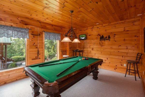 Pool table at A Beautiful Memory, a 4 bedroom cabin rental located in Pigeon Forge