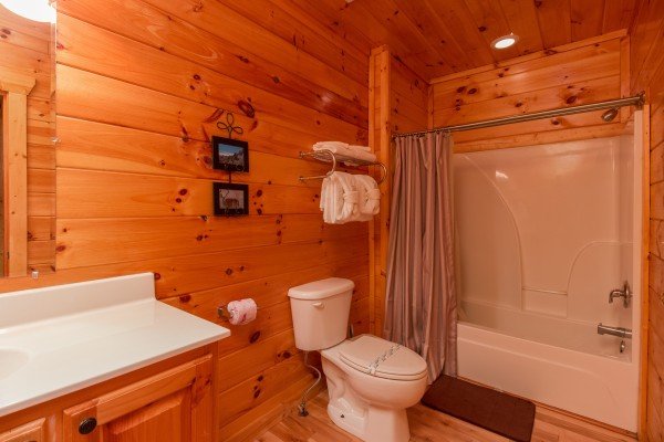Bathroom with a tub and shower at A Beautiful Memory, a 4 bedroom cabin rental located in Pigeon Forge