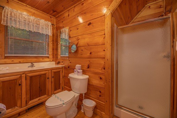 Bathroom with a shower stall at Firefly Ridge, a 2 bedroom cabin rental located in Pigeon Forge