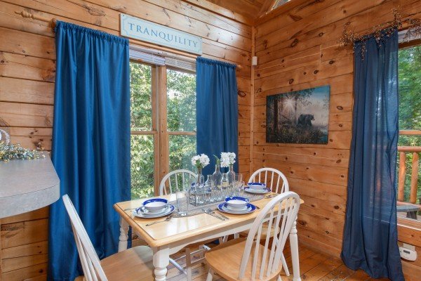 Dining table for four at My Blue Heaven, a 1 bedroom cabin rental located in Gatlinburg