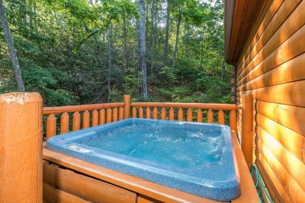Hot tub on the deck at My Blue Heaven, a 1 bedroom cabin rental located in Gatlinburg