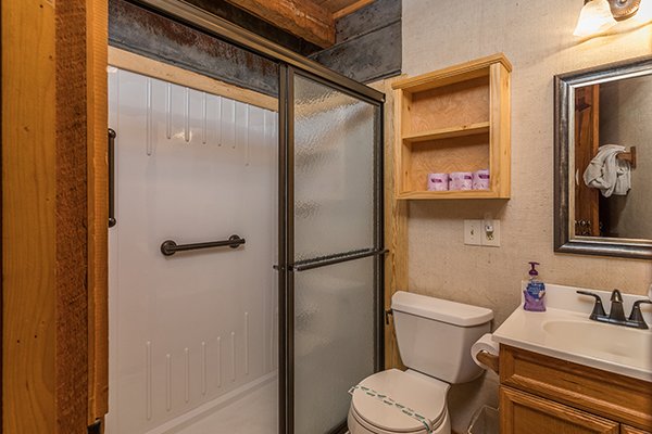 Bathroom with a walk in shower at Little Bear, a 1 bedroom cabin rental located in Pigeon Forge