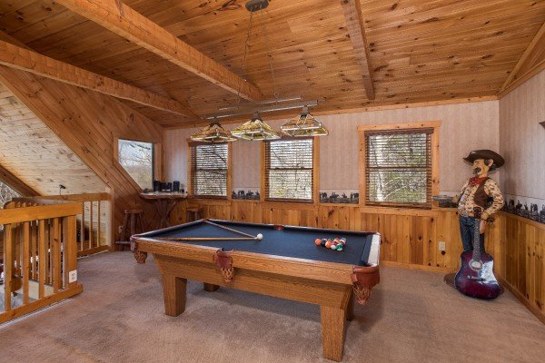 Pool table at Hooked on Cowboys Lodge, a 2 bedroom cabin rental located in Pigeon Forge
