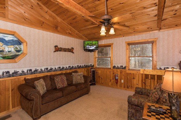 Lodge seating at Hooked on Cowboys Lodge, a 2 bedroom cabin rental located in Pigeon Forge