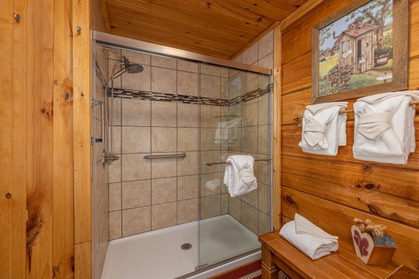 Large glass shower in a bathroom at Bearfoot Adventure, a 2 bedroom cabin rental located in Gatlinburg