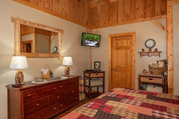 Dresser and TV in the loft bedroom at Bearfoot Adventure, a Gatlinburg Cabin rental