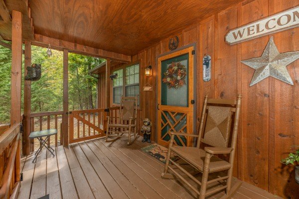 Screened porch at Black Bear Holler, a 2 bedroom cabin rental located in Pigeon Forge