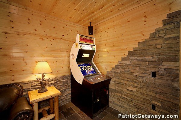 Arcade game at Incredible! A 6 bedroom cabin rental located in Gatlinburg