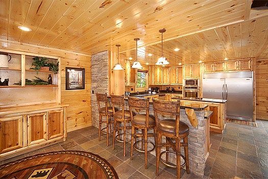 Breakfast bar in the kitchen at Incredible! A 6 bedroom cabin rental located in Gatlinburg