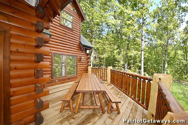 Double picnic tables on the deck Incredible! A 6 bedroom cabin rental located in Gatlinburg