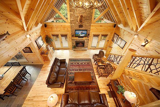 Looking down into living room from the loft at Incredible! A 6 bedroom cabin rental located in Gatlinburg